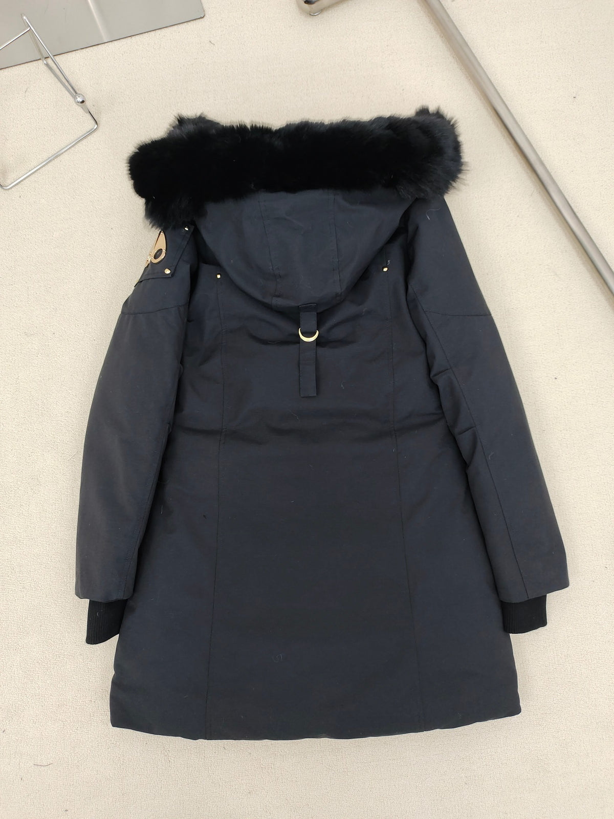 Moose Knuckles Women's Longline Hooded Parka with Pom-Pom Detail