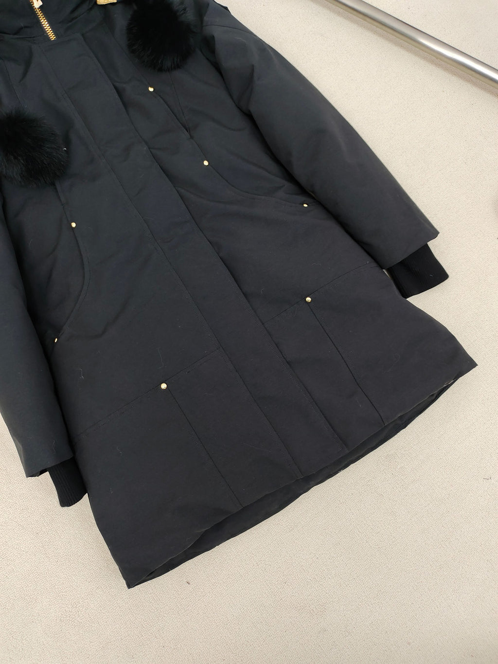Moose Knuckles Women's Longline Hooded Parka with Pom-Pom Detail